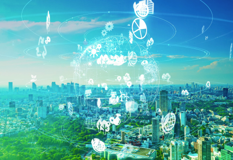 ESG symbols floating in a blue sky with a green city in the background