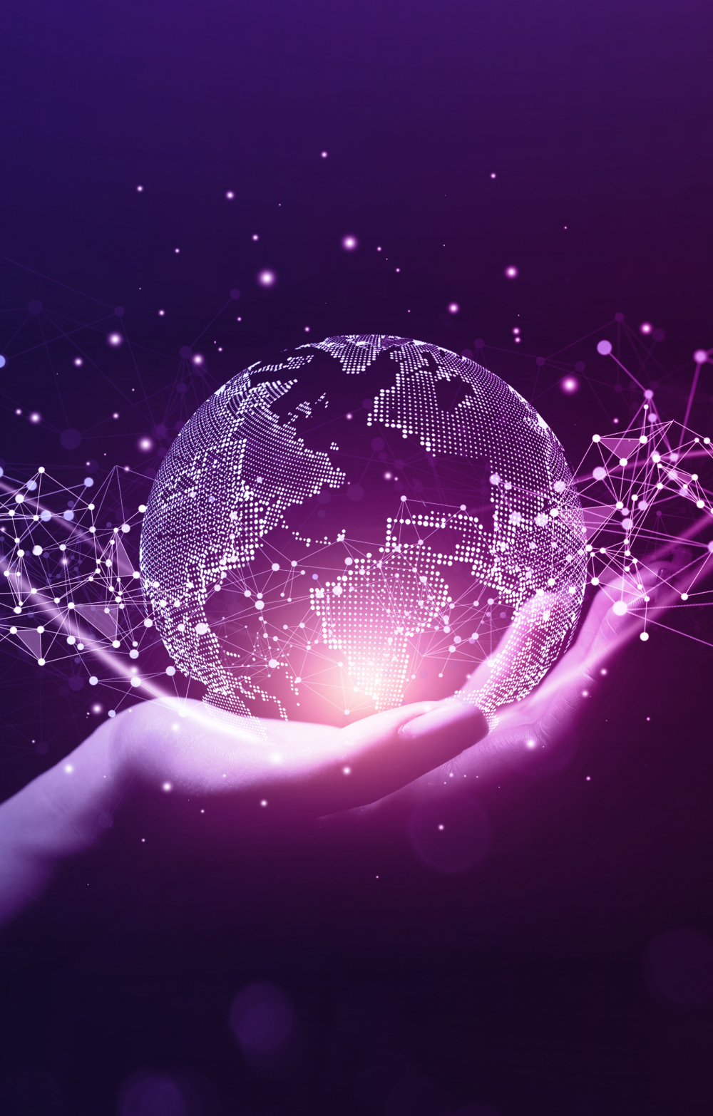 hand of a woman holding an illumanated globe very Dr Who style against a dark background