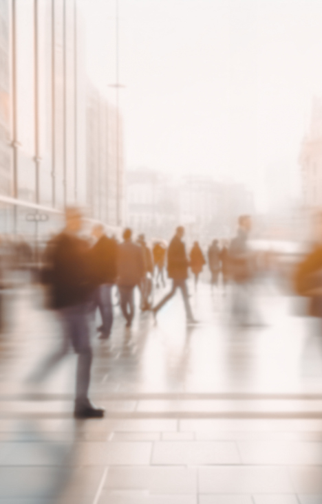 people walking in a business pedestrian precinct