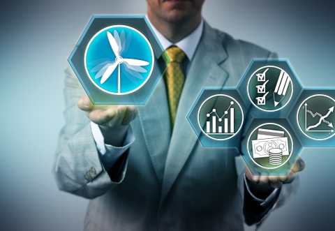 Man in suit in a balancing act of ESG symbols