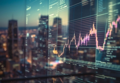 Double exposure of abstract creative financial chart hologram and world map on modern business center exterior background, research and strategy concept