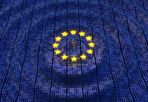Circle of EU stars against a textile like blue background